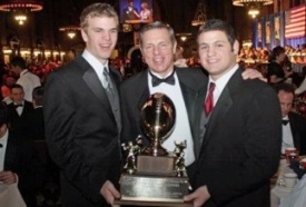 After his first unbeaten season in 2008, New Canaan High’s Lou Marinelli, center, was named Connecticut High School Football Coach of the Year.