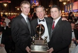 After his first unbeaten season in 2008, New Canaan High’s Lou Marinelli, center, was named Connecticut High School Football Coach of the Year.