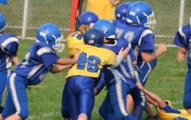 Break down youth football players into small groups in practice to develop chemistry
